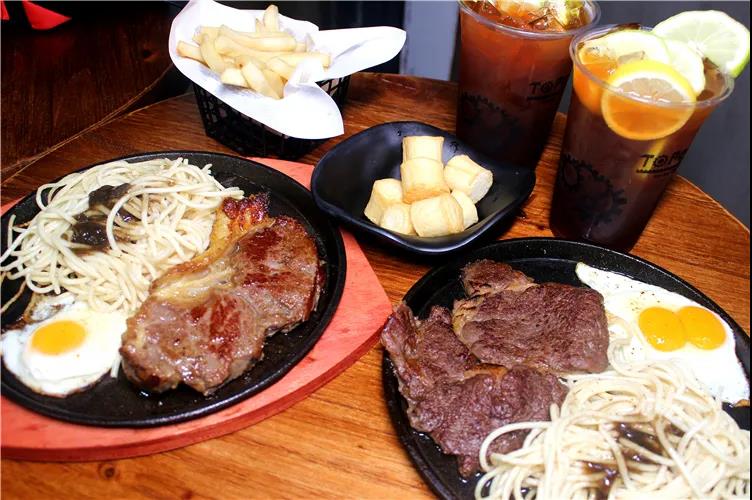 【越秀.海珠2店通用】放开你的胃,火焰牛扒让你大块朵颐!¥99抢「TOP ONE美式牛扒」美式西冷扒+美式肉眼扒+柠檬茶+小食